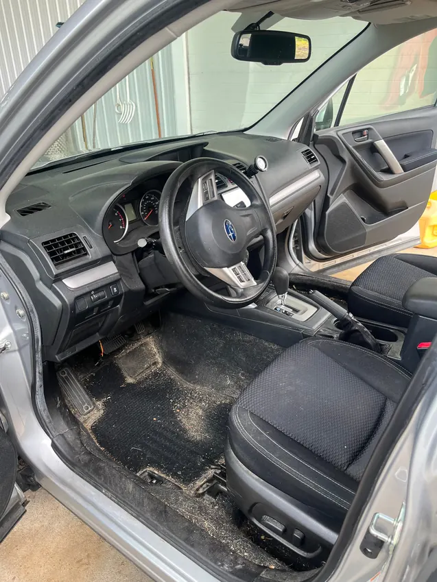 Subaru Forester interior detail — before