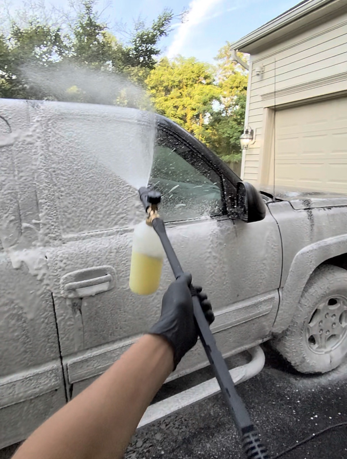 Large family SUV getting a foam wash