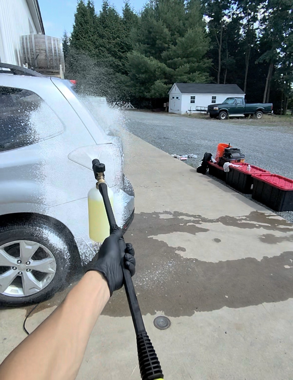 Subaru Forester foam wash in the driveway